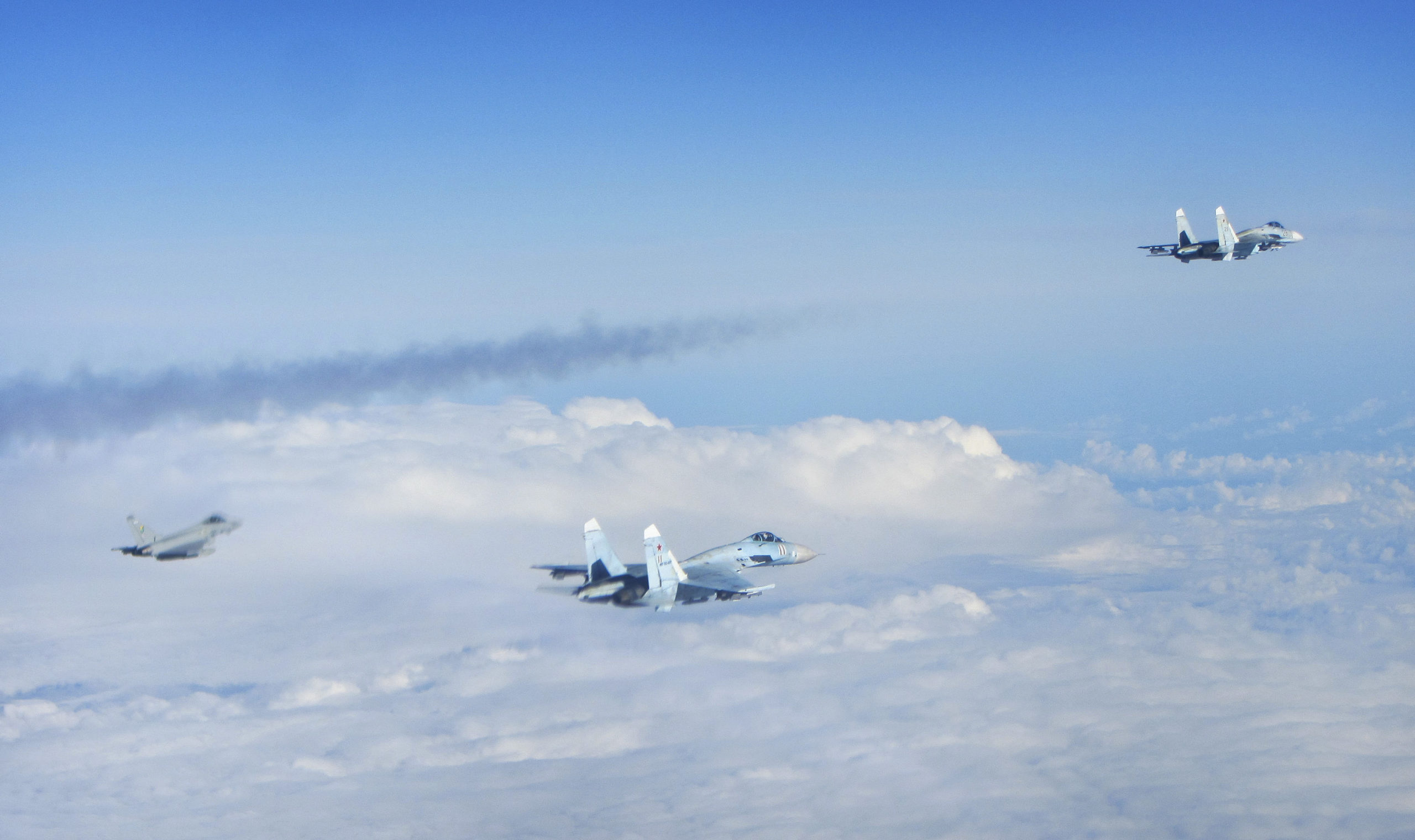 Photos Of NATO Fighters Intercepting Fully Armed Russian Jets