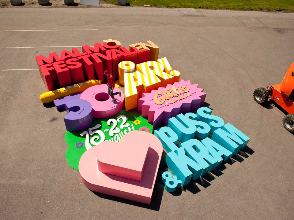 Cool 3D Poster Is Made With Letters So Big That They Can Crush A Human