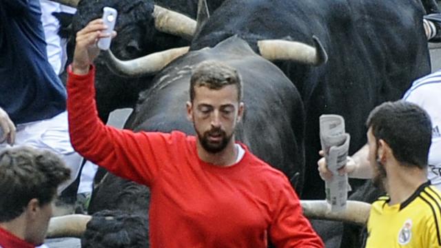 Idiot Tries To Take Selfie While Running With The Bulls
