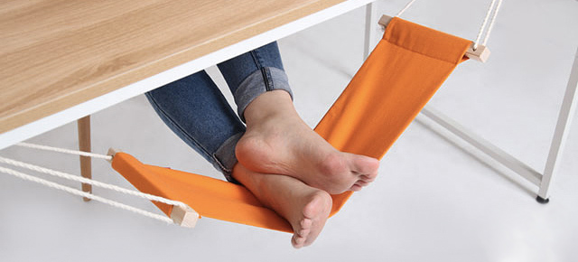 An Under-Desk Hammock For Your Feet Is The Best Office Upgrade