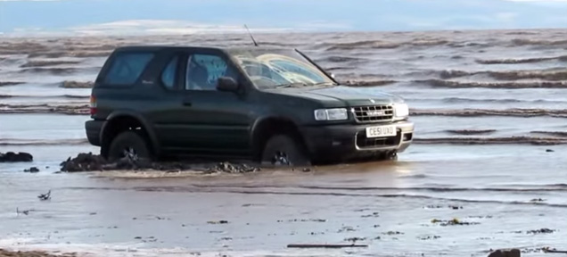 Guy Parks On The Beach And His Car Gets Swallowed By The Tide
