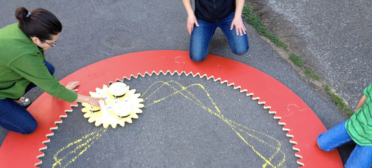 Woman Builds Giant Spirograph, Takes Chalk Art To The Next Level
