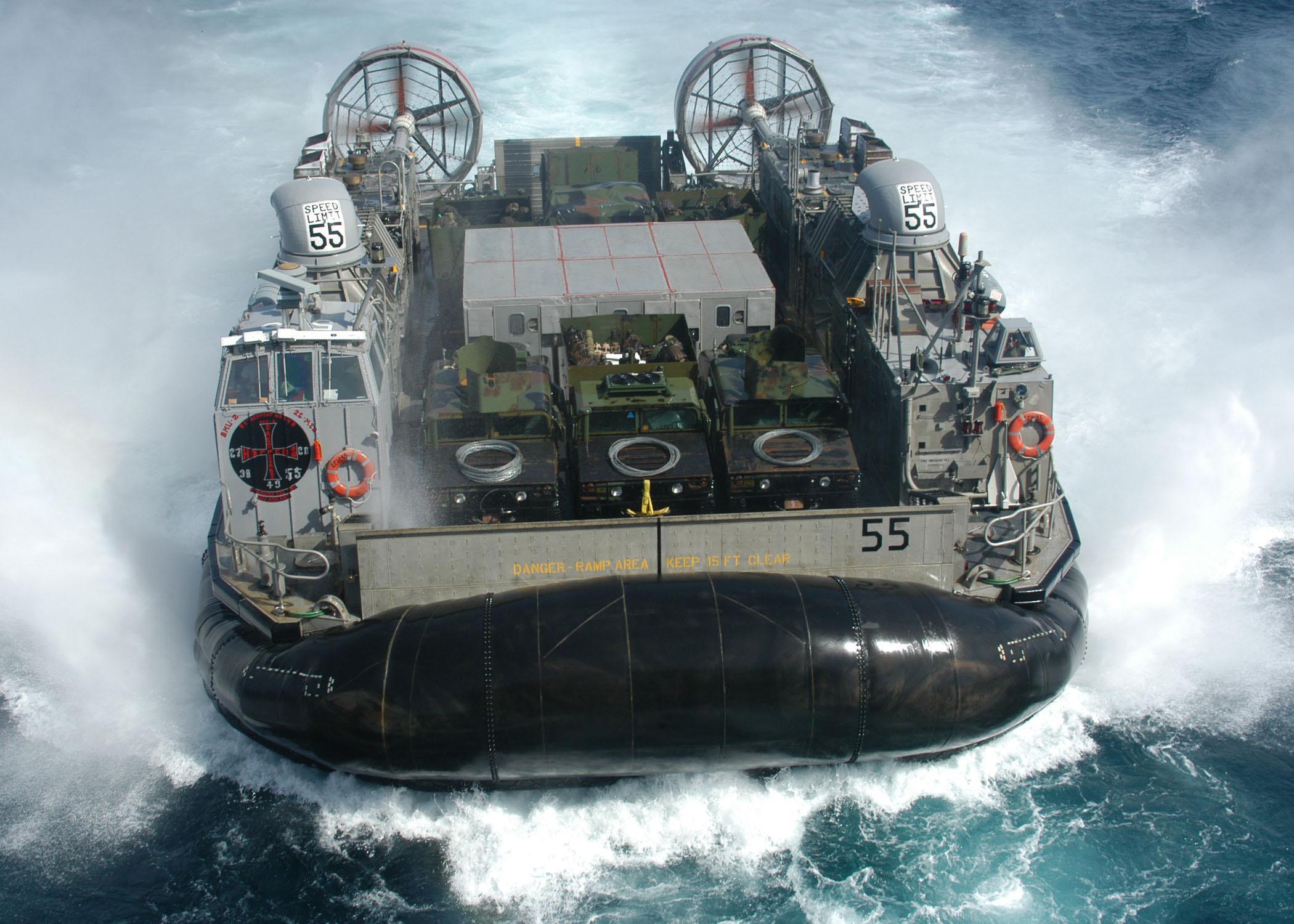 US Navy Sailors Inside An Amphibious Assault Ship — Or A Lost Aliens Scene