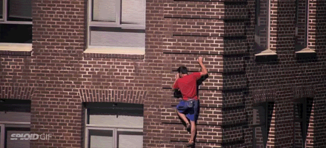 Guy Climbs A Building With No Equipment Like A Real-Life Spider-Man