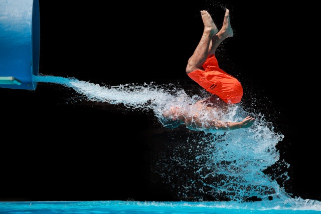 The Absurd Joy Of Waterslides Is Captured In These Perfectly Timed Shots