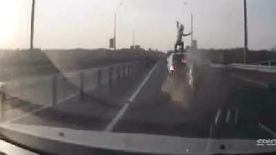 Motorcyclist Crashes, Flips And Sticks A Perfect Landing On A Car’s Roof