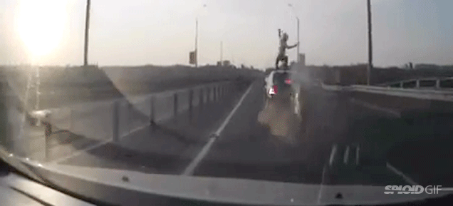 Motorcyclist Crashes, Flips And Sticks A Perfect Landing On A Car’s Roof