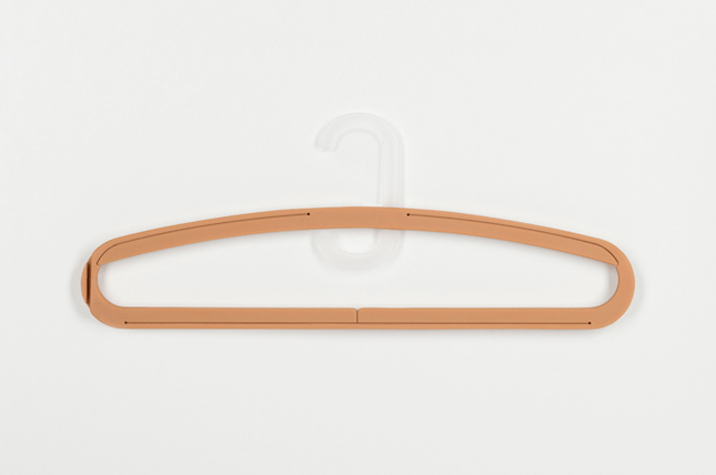 A Smart Transforming Hanger Will Double The Capacity Of Your Closet