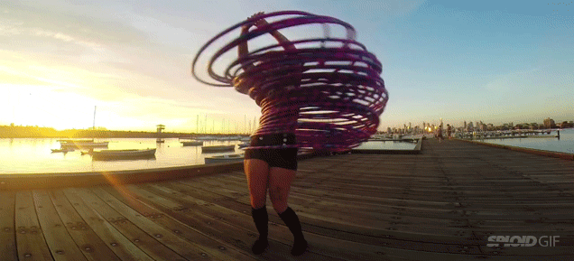 Girl Dancing With 30 Hula Hoops Looks Like She’s About To Get Teleported