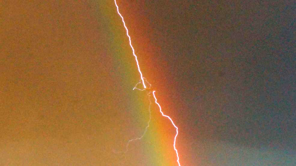 Amazing Photo Shows Lightning Striking An Airliner Flying In A Rainbow