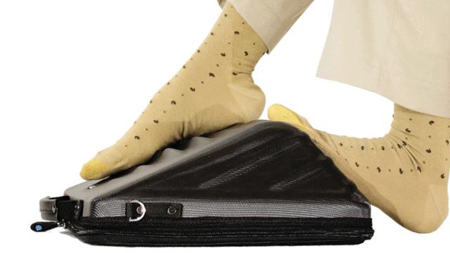 Maybe Less Flights Will Be Diverted With This Foot-Massaging Laptop Bag