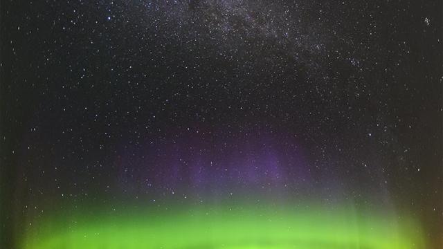 Incredible Photo Of The Milky Way Rising Over Green And Violet Auroras