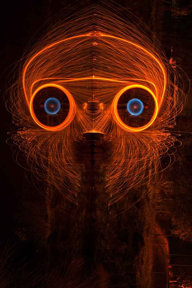 Light Monster Faces Made Of Spinning Molten Metal