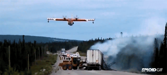 Badass Aeroplane Pilot Extinguishes Truck Fire With One Water Drop