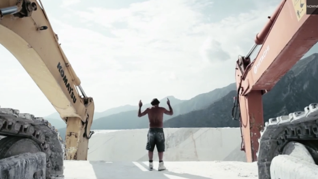 Watch A Man Direct Marble Quarry Excavators With Subtle Hand Gestures