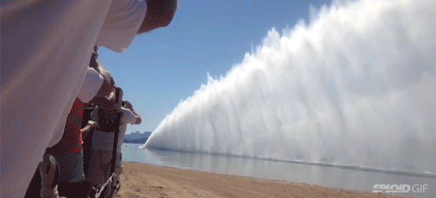 Drag Boat Racing Shoots Up An Awesome Wall Of Water Behind It