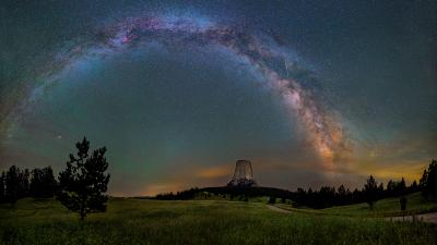 A Magnificent Photo Of The Milky Way Arching Over Devils Tower
