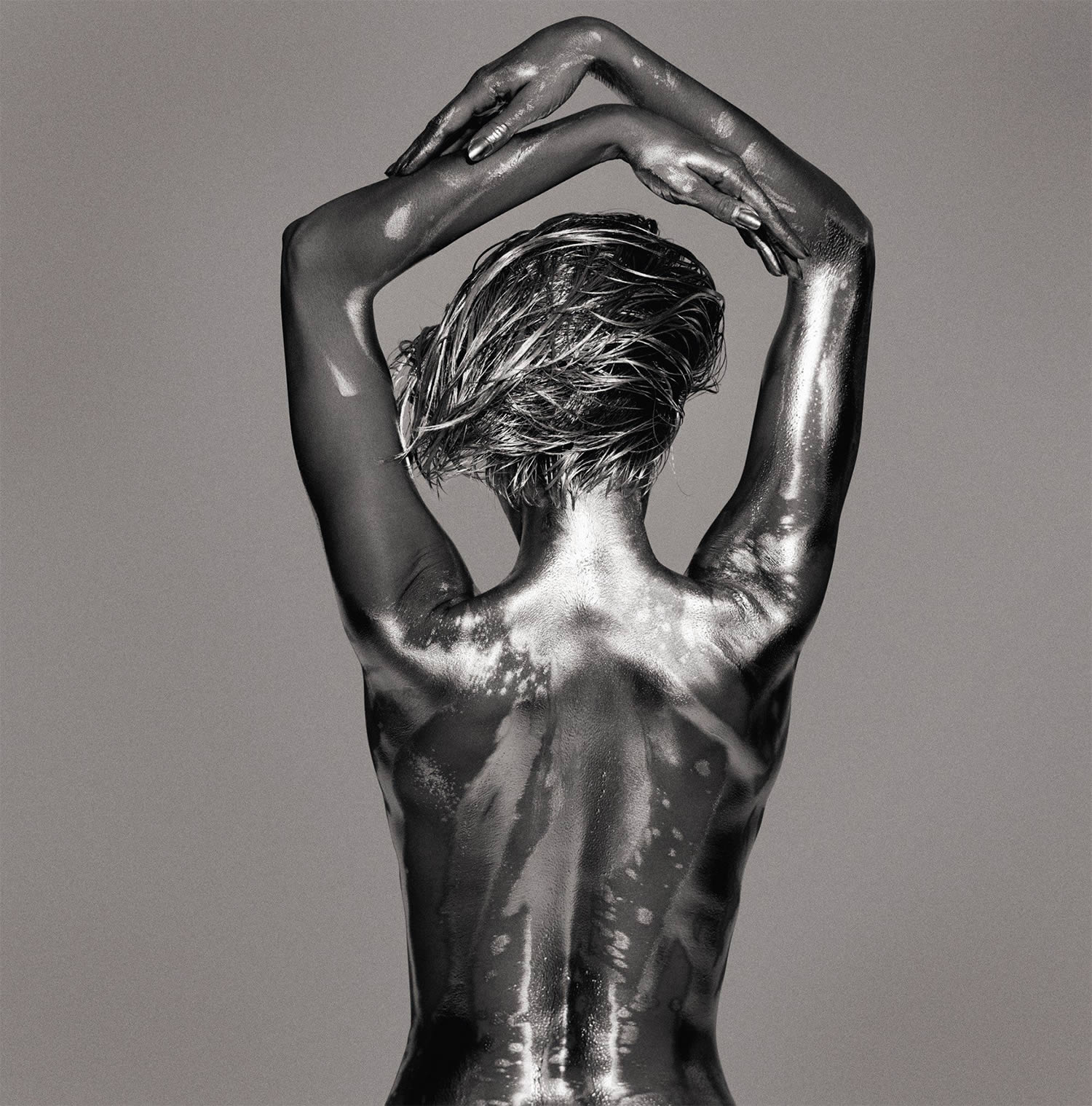 Photographer Transforms Women Into Beautiful Metallic Statues [NSFW]