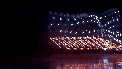 Watching These Cyclists Spin Around In Light Suits Is So Mesmerising