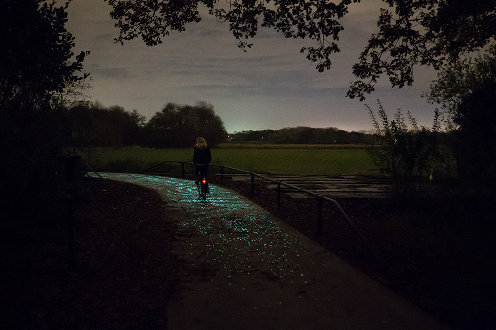 World’s First Glow-In-The-Dark Bike Path Glimmers A Ghostly Green