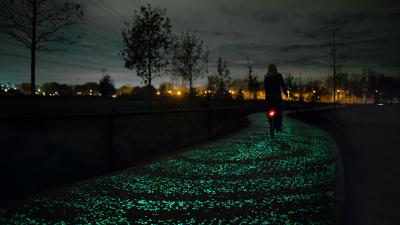 World’s First Glow-In-The-Dark Bike Path Glimmers A Ghostly Green