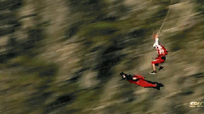 Mad Man Uses Insane Wingsuit Jumper As His Personal Flying Carpet