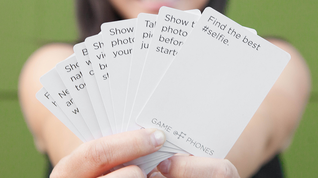 A Card Game That Requires You To Keep Your Phone Out Is Genius