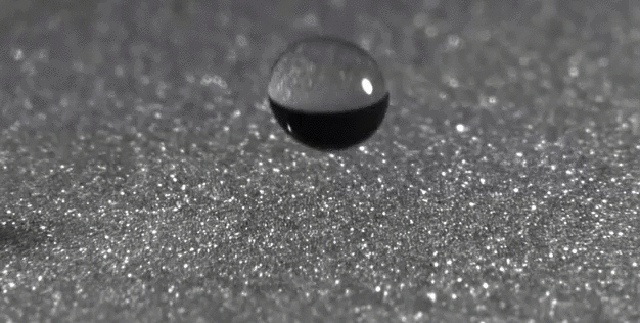 Slow-Mo Video Reveals Raindrops On Sand Behave Like Asteroid Impacts
