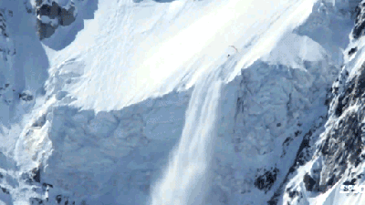 Daredevil Skier Rides An Avalanche, Flies Off A Cliff