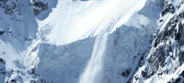 Daredevil Skier Rides An Avalanche, Flies Off A Cliff