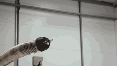Tesla Building Robotic Snakes That Emerge From Walls To Charge Cars