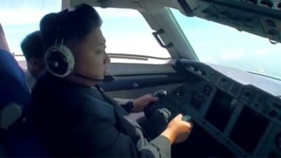 Watch The Almighty Kim Jong-un Allegedly Flying A Plane By Himself
