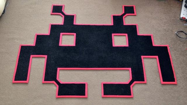 A Retro Rug That Only Battles Dirty Shoes, Not Invaders From Space