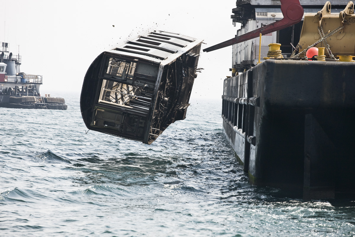 The Spectacular Sight Of Train Carriages Being Dumped Into The Ocean
