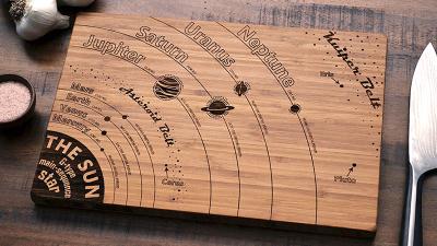 There’s A Guide To The Solar System Etched Into This Cutting Board