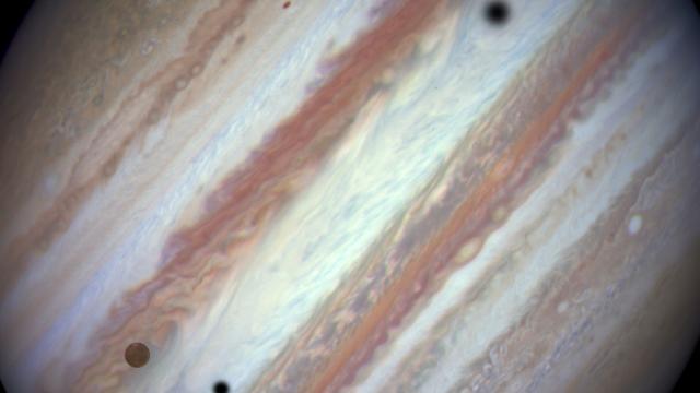 In This Breathtaking Image, Three Moons Transit The Face Of Jupiter