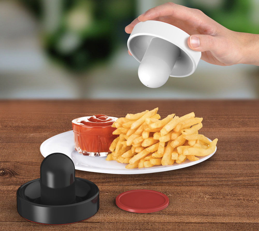 Paddle Salt And Pepper Shakers Bring Air Hockey To The Dinner Table