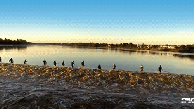 This River Tidal Bore Makes People Surf For 15 Minutes Non-stop