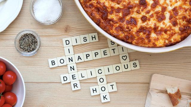 The Perfect Potholder For Crossword-Loving Chefs