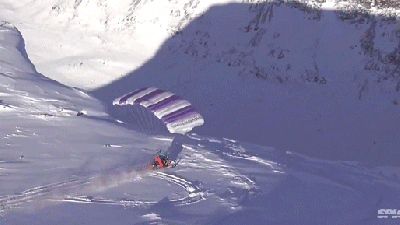 Crazy Guy Rode His Snowmobile Off A Cliff And Then Started Flying