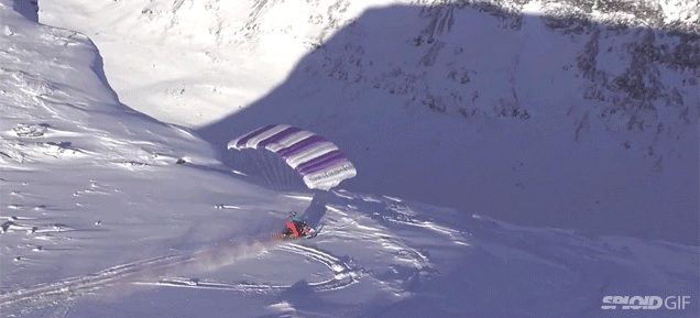 Crazy Guy Rode His Snowmobile Off A Cliff And Then Started Flying