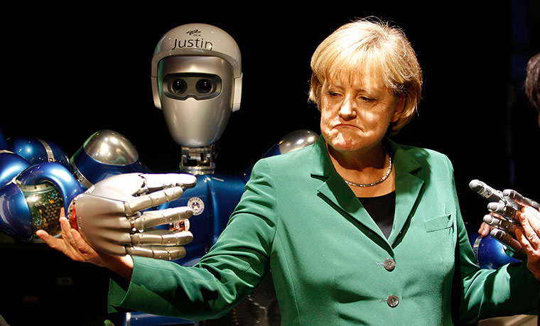 Why Is Angela Merkel Always Palling Around With Robots?