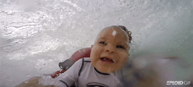 Awesomely Cute Baby Surfs With His Dad For The First Time