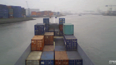 The Mesmerising Ballet Of Container Ships Moving Around A Shipping Dock