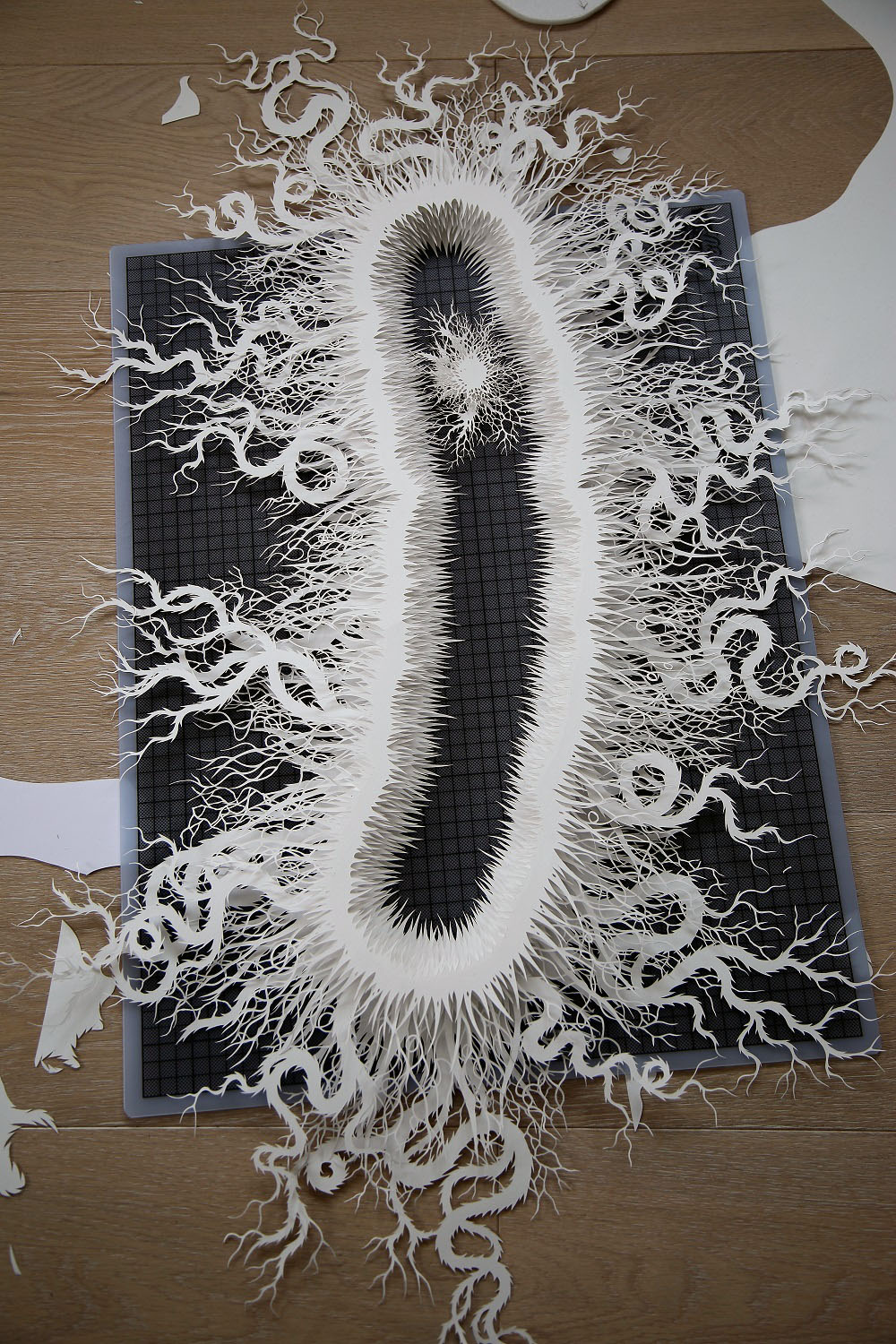 This Haunting Bacteria Is Actually An Intricate Hand-Cut Paper Sculpture