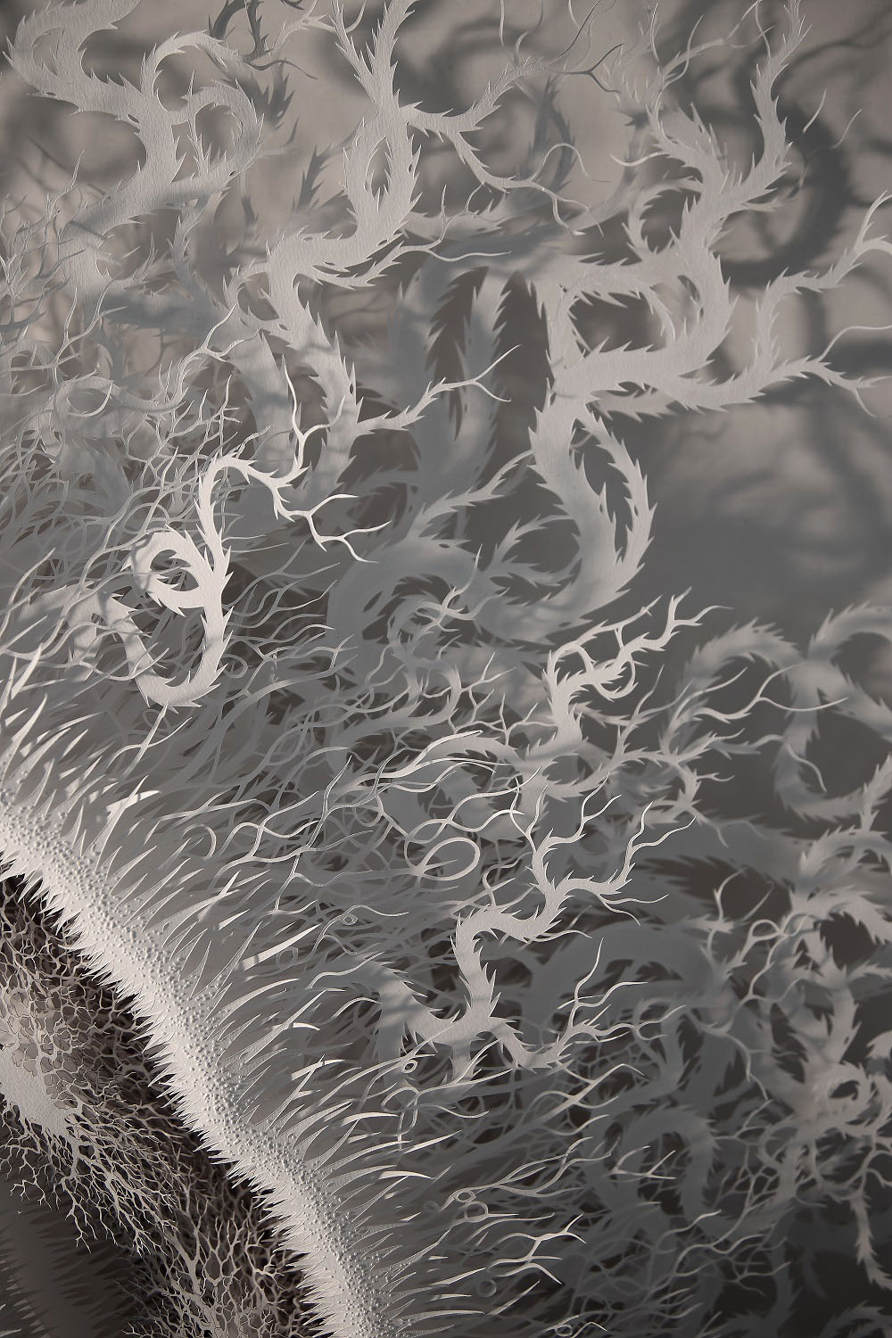 This Haunting Bacteria Is Actually An Intricate Hand-Cut Paper Sculpture