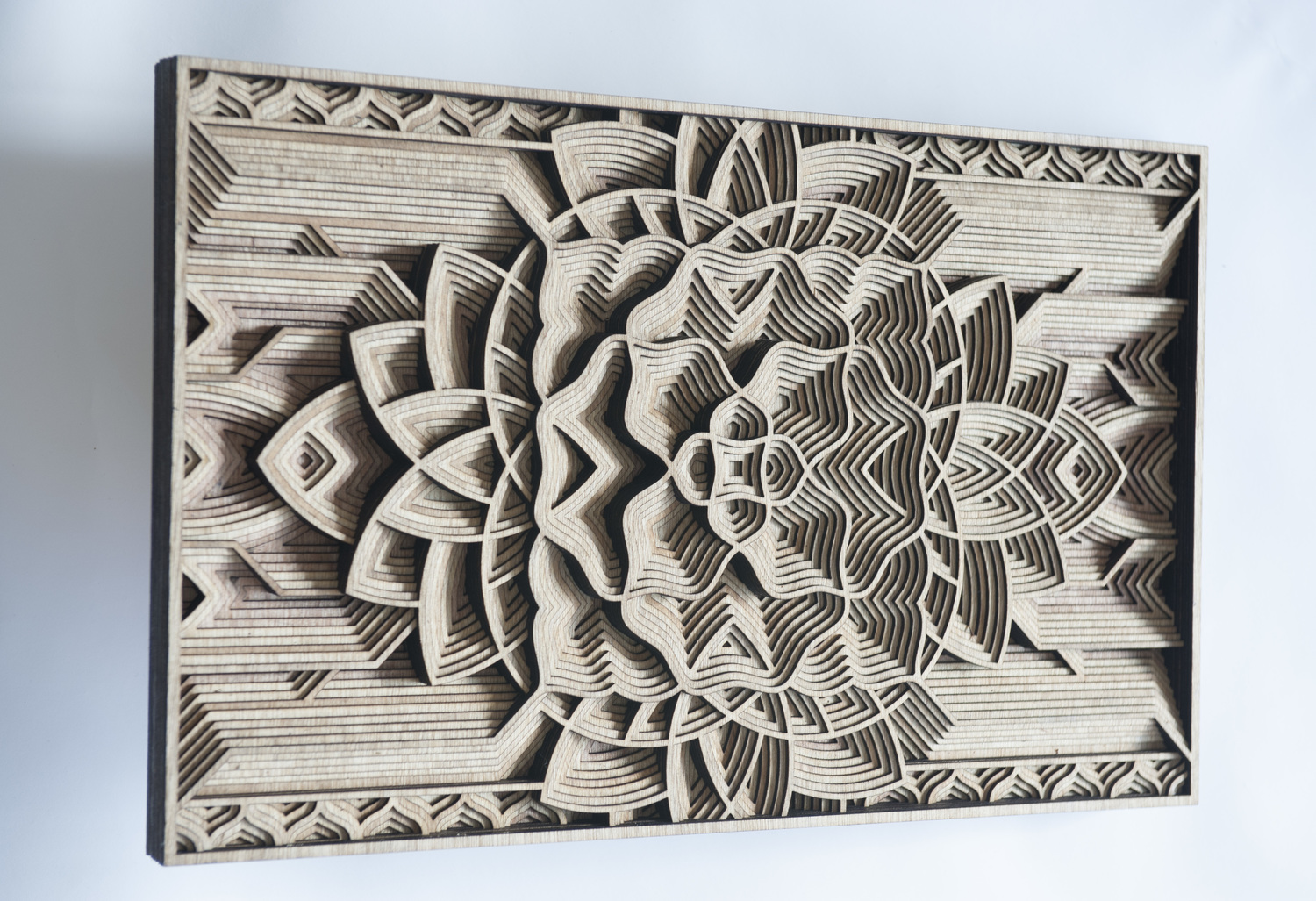 Artist Creates Stunning Wooden Sculptures With Laser Cutting Tech
