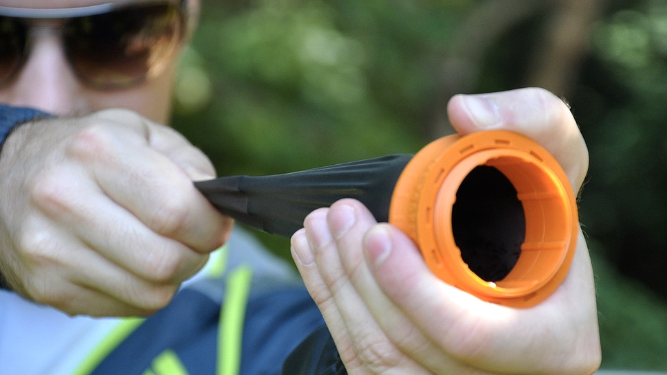 A Collapsible Rubber Cone Lets This Tiny Slingshot Hide In Your Pocket