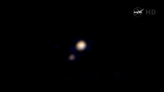 New Horizons’ First Colour Photo Of Pluto Is One Awe-Inspiring Blur