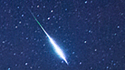 Meteor Streaks Across The Sky And Leaves A Trail In The Shape Of A Z